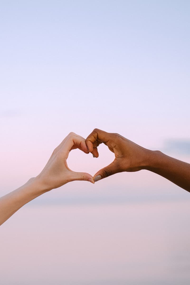 Two hands forming a heart shape